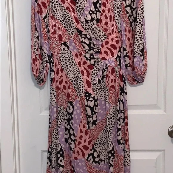 river island pink leopard print dress River Island Plus animal print midi dress in pink